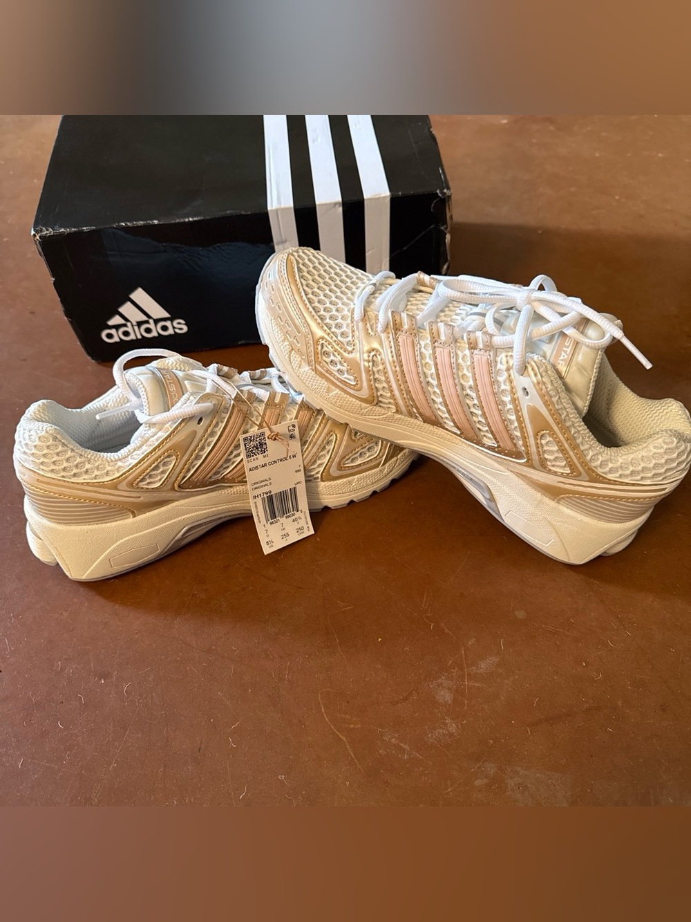 adidas Women’s White Sneakers with Pale Pink Accents